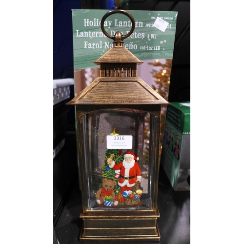 3316 - Holiday Scene Lantern (314-329) *This lot is subject to vat