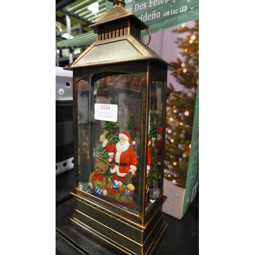 3316 - Holiday Scene Lantern (314-329) *This lot is subject to vat