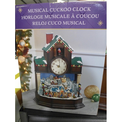 3344 - Festive Musical Cuckoo Clock  (314-268) *This lot is subject to vat