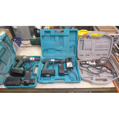 2009 - 3 Boxed power tools - 2 Push 24v cordless drills with batteries and chargers and a 230v hammer drill... 