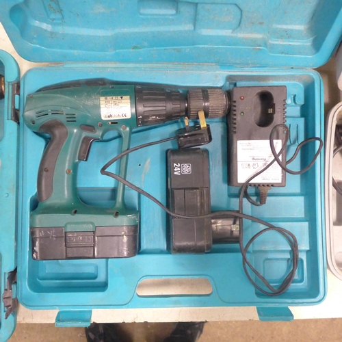 2009 - 3 Boxed power tools - 2 Push 24v cordless drills with batteries and chargers and a 230v hammer drill... 