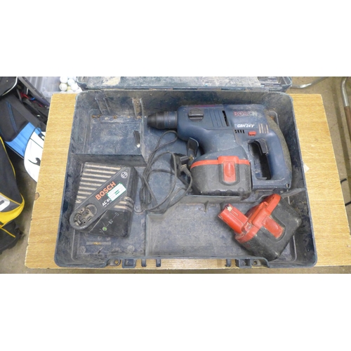 2013 - A Bosch GBH 24v cordless hammer drill with battery and charger - in case