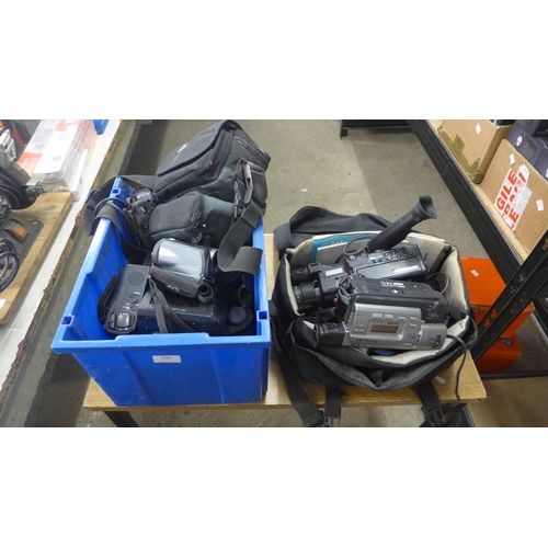 2081 - A large quantity of various cameras including: a Sony handicam (CCDF340E), a Sharp camcorder (VL-E34... 