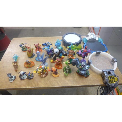 2103 - A box of assorted gaming items including games figures and accessory's