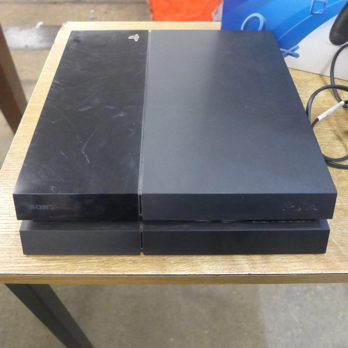 2114 - A PlayStation 4 500GB console, boxed - with power cables, no controller - W