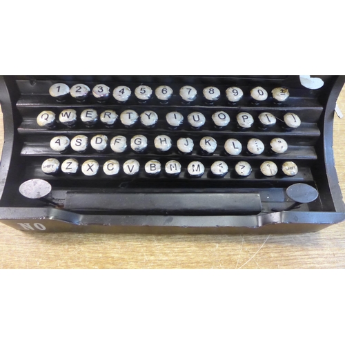 2120 - A tin plate decorative typewriter