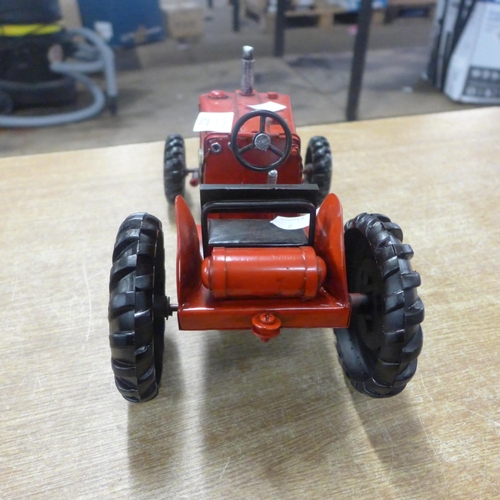 2128 - A tin plate tractor