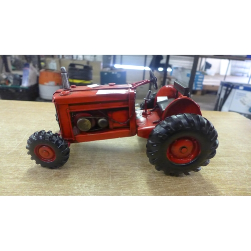 2128 - A tin plate tractor