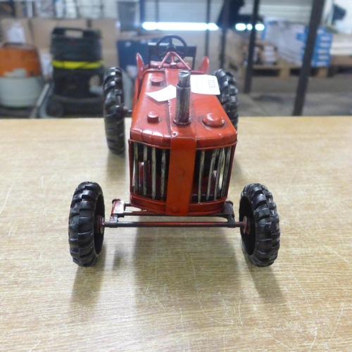 2128 - A tin plate tractor