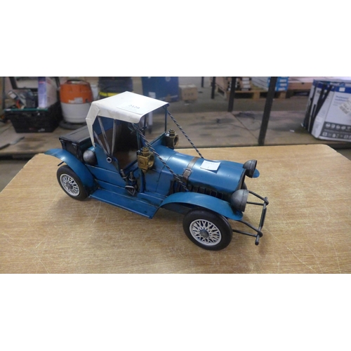 2129 - A tin plate Model T Ford style vintage car