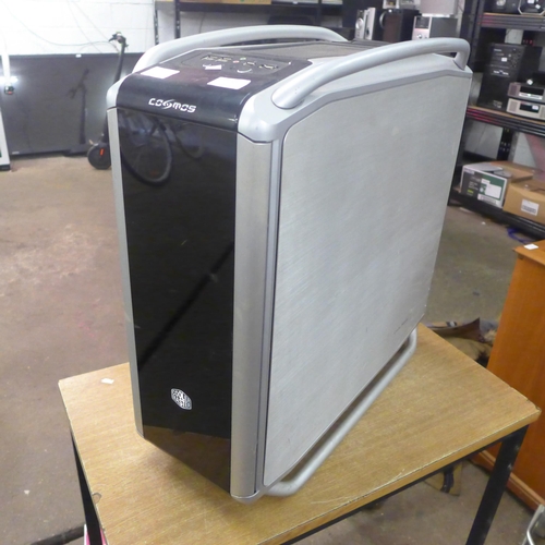 2140 - A Cosmos Coolermaster gaming PC with a gigabyte power supply, 8gb Patriot memory PC3-12800 DDR3 RAM,... 