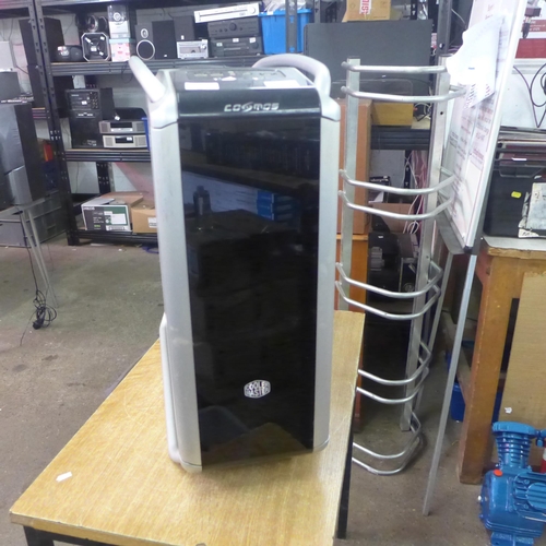 2140 - A Cosmos Coolermaster gaming PC with a gigabyte power supply, 8gb Patriot memory PC3-12800 DDR3 RAM,... 