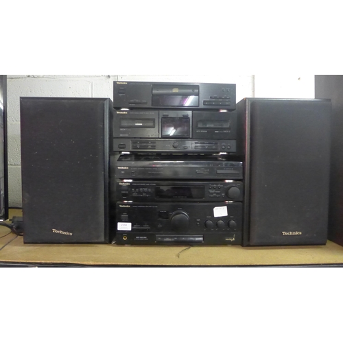 2154 - A quantity of Technics stereo equipment including: a compact disk player (SL-PJ28A), a double casset... 