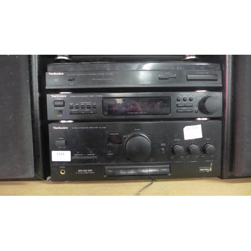 2154 - A quantity of Technics stereo equipment including: a compact disk player (SL-PJ28A), a double casset... 