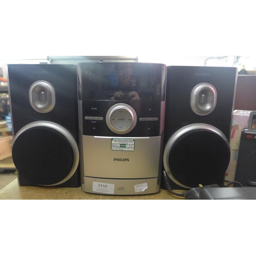 2159 - Philips (MC147) CD player with speakers and box of CDs