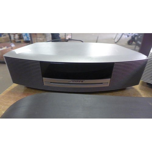 2165 - A Bose wave (AWRC3P) radio/CD player and a Bose wave music system with remote and a Sony (ETBT201Y) ... 