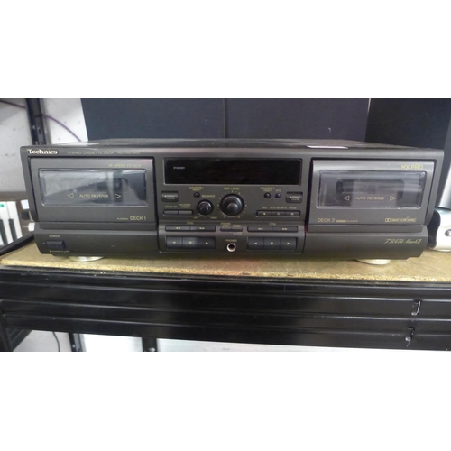 2171 - A Technics stereo cassette deck (RS-TR474M2) with a pair of Sharp speakers (CP-270E)