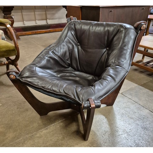 63A - An Odd Knutsen style beech and brown leather Luna chair