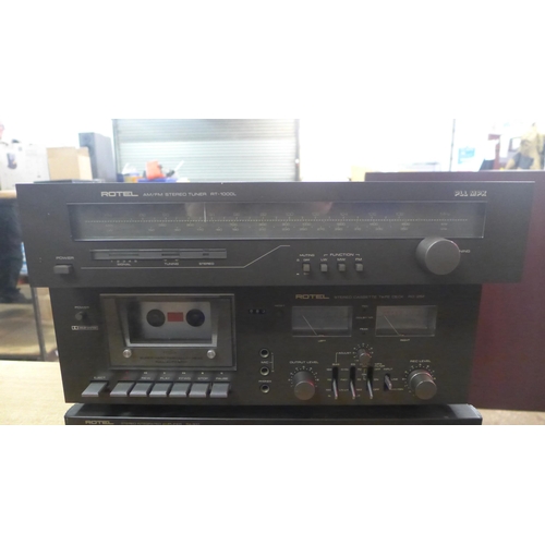 2180 - Three Rotel seperates- A stereo cassette tape deck (RD-25F), a stereo tuner(RT-1000L) and a integrat... 