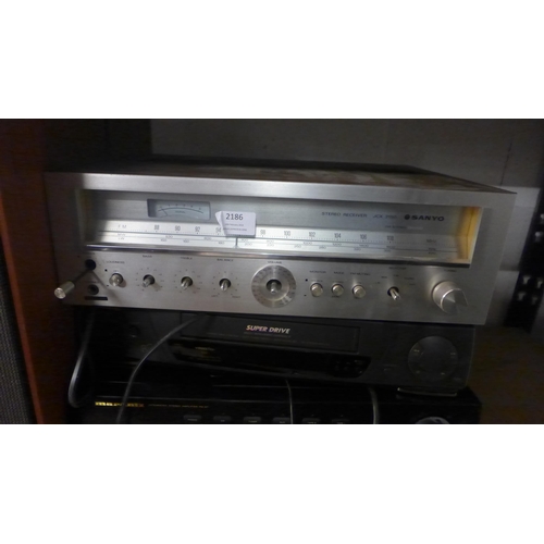 2186 - An Assorted lot of stereo equipment including- A Marantz integrated amp (PM-47), a technics compact ... 