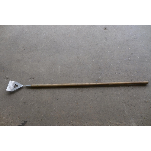 2223 - A quantity of garden tools, including a hoe, a rake, a spade and a pick axe, etc.