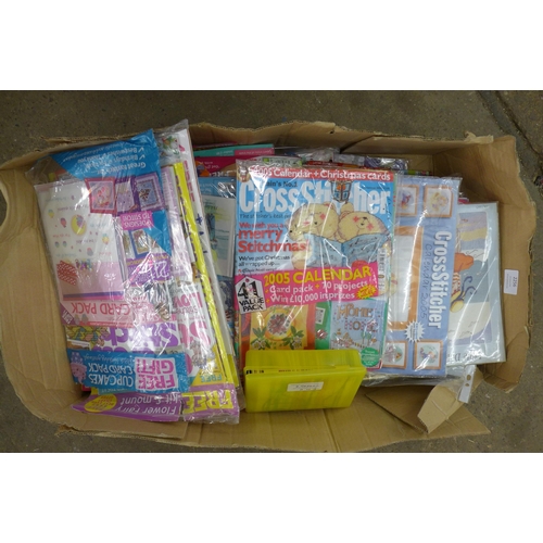 2256 - A box of approx. 40 cross stitch magazines and surplus