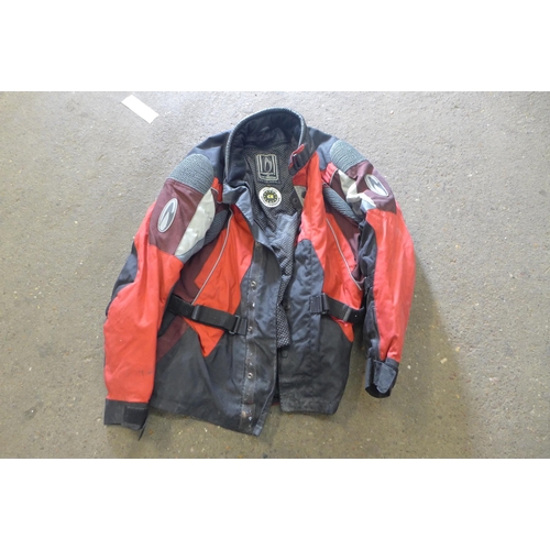 2265 - A quantity of motorcycle equipment - 2 helmets and 2 armoured jackets