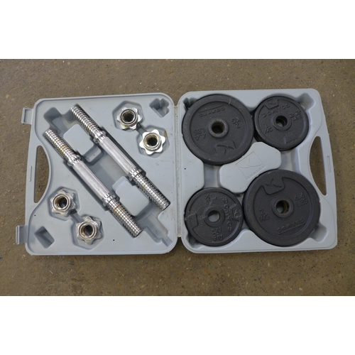 2306 - A cased set of cast  iron weights