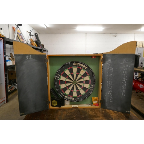 2345 - A Winmau dart board in Lindop sports case with darts and chalk