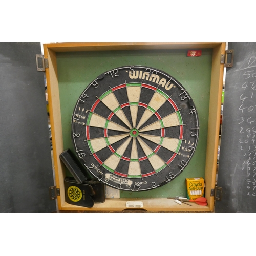 2345 - A Winmau dart board in Lindop sports case with darts and chalk