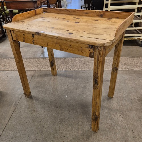 188 - A George III stripped pine kitchen table