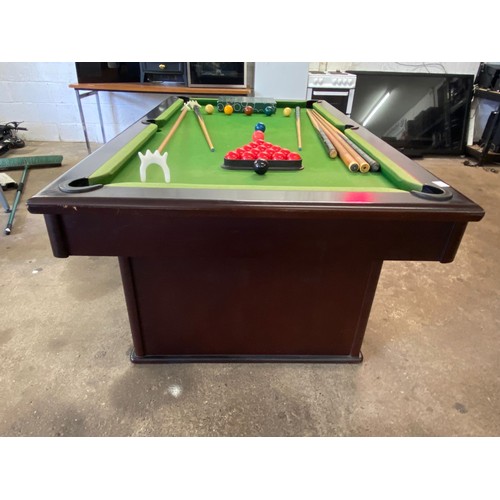 2206 - A darkwood slate bed pool table with cues, ball, score board