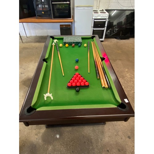 2206 - A darkwood slate bed pool table with cues, ball, score board