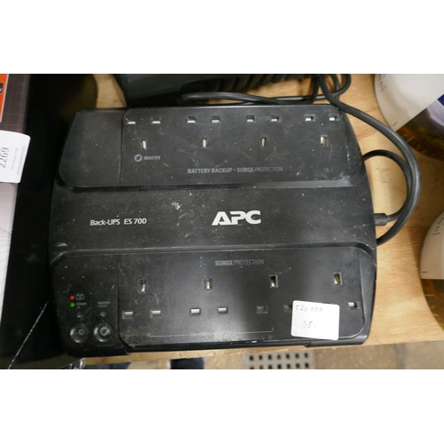 2268 - A APL battery back up computer power system (ES-400) and (ES-700) with surge protection and battery ... 