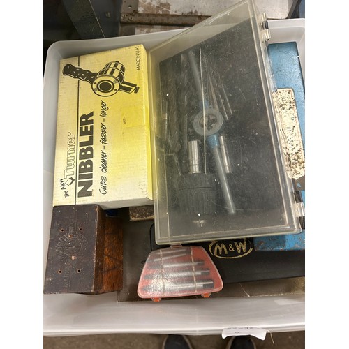 2046 - A box of engineering tools including taps and dies, drill bits, punches, bolt removing kit, etc.