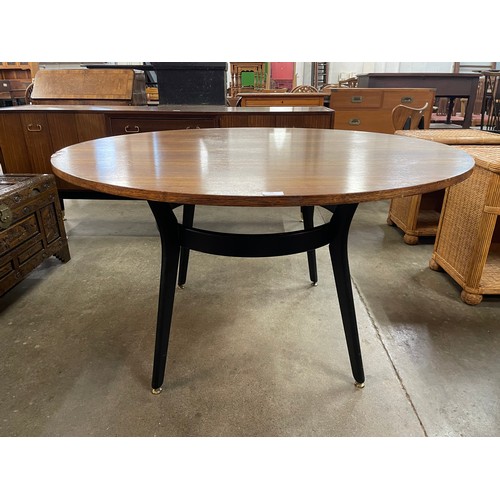 37 - A G-Plan Librenza tola wood and black circular dining table