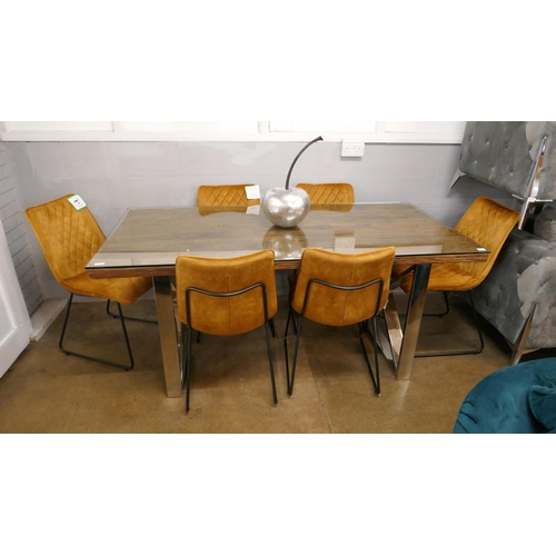 1315 - A Chennai 180cm dining table and a set of six turmeric velvet dining chairs * this lot is subject to... 