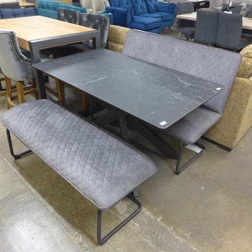 1366 - A charcoal ceramic dining table and two grey upholstered benches * this lot is subject to VAT