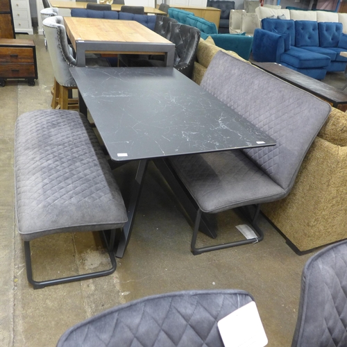 1366 - A charcoal ceramic dining table and two grey upholstered benches * this lot is subject to VAT