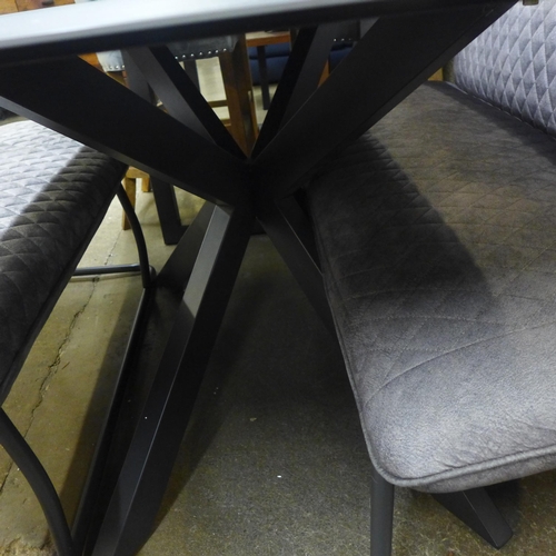 1366 - A charcoal ceramic dining table and two grey upholstered benches * this lot is subject to VAT