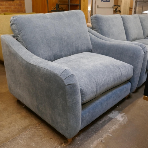 1397 - A Hattie Ansell aqua corner sofa, loveseat and storage footstool