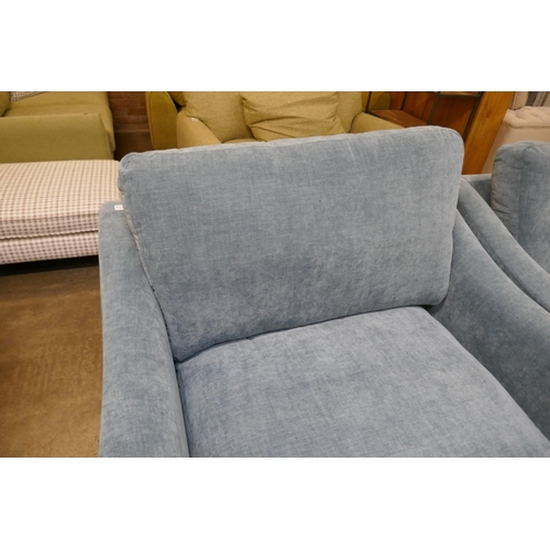 1397 - A Hattie Ansell aqua corner sofa, loveseat and storage footstool