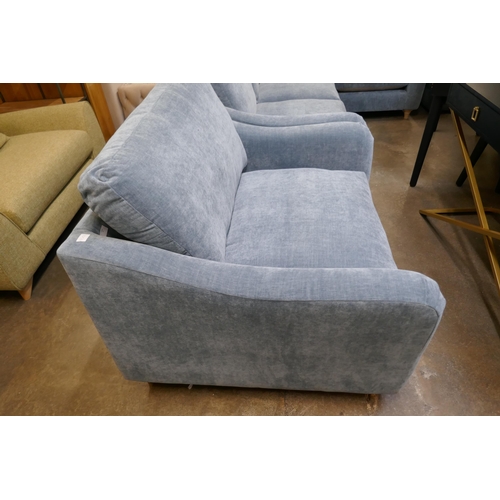 1397 - A Hattie Ansell aqua corner sofa, loveseat and storage footstool