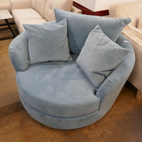 1400 - An aqua velvet swivel love seat