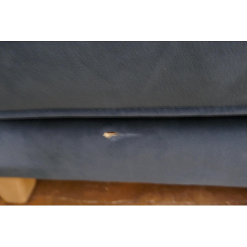 1410 - A blue velvet footstool - damaged