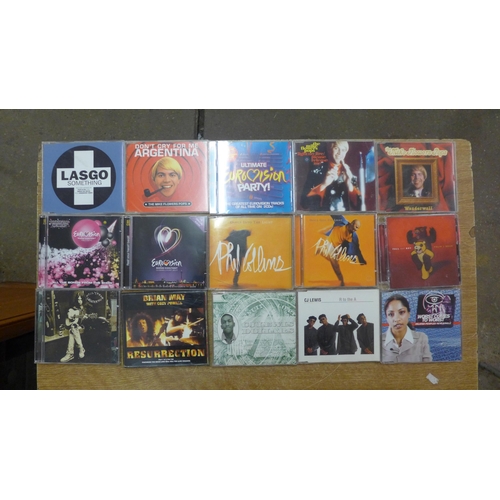 An Asda Price CD micro system and a pair of stereo speakers with box of CDs including Phil Collins,