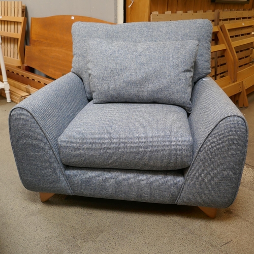 1517 - A Mina Chanel indigo chair and contrasting mina blue three seater sofa