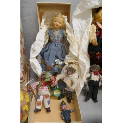 1125 - Four boxed vintage costume dolls, twelve Austrian Peter hedgehog dolls and others **PLEASE NOTE THIS... 