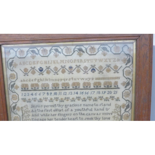 601 - A William IV sampler, worked by Jane Cox, aged 13 and dated 1834, framed