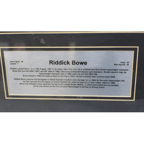 610 - A Riddick Bowe photo montage, main photo signed, with presentation plaque, framed and a Blues Brothe... 